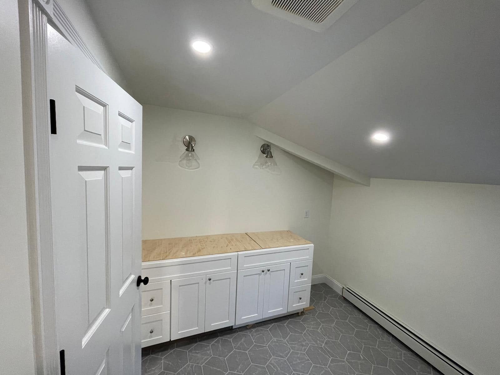 Freshly painted white interior with cabinets