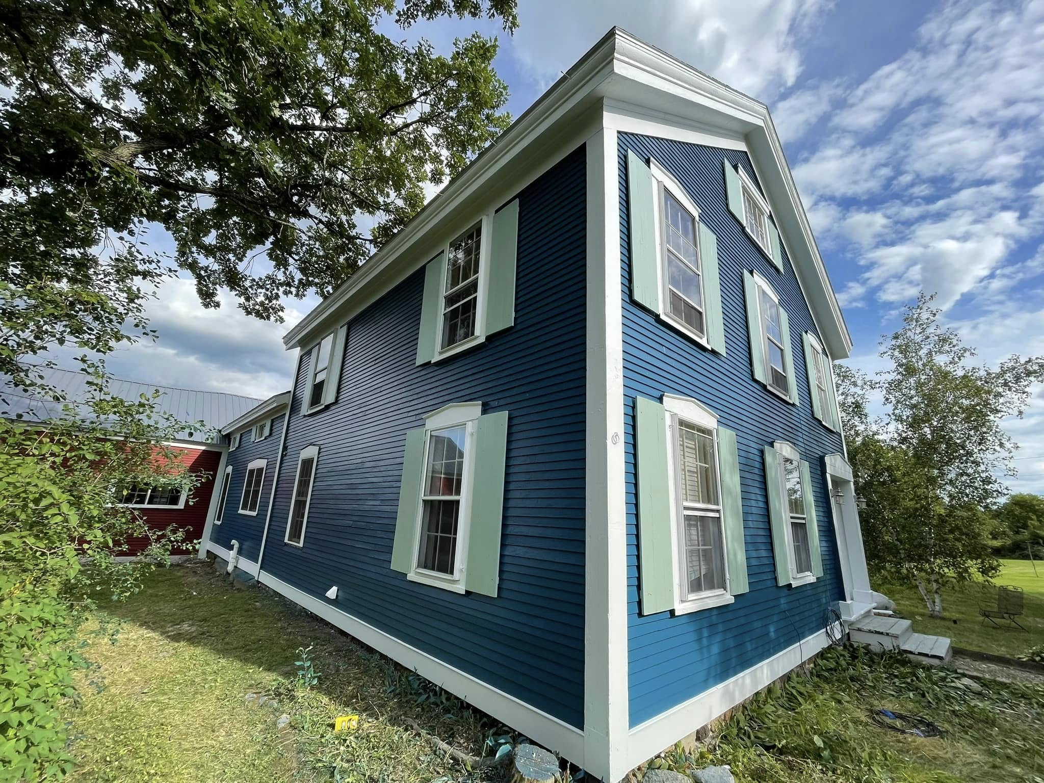 Blue exterior home painting project